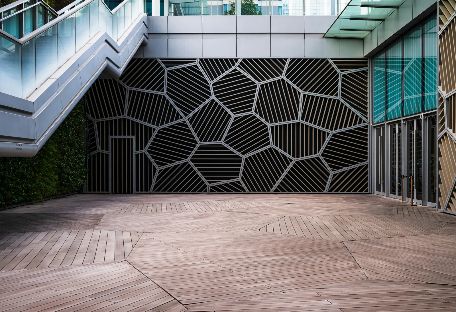 Modern paver patio with large-format neutral-toned pavers and contemporary outdoor furniture